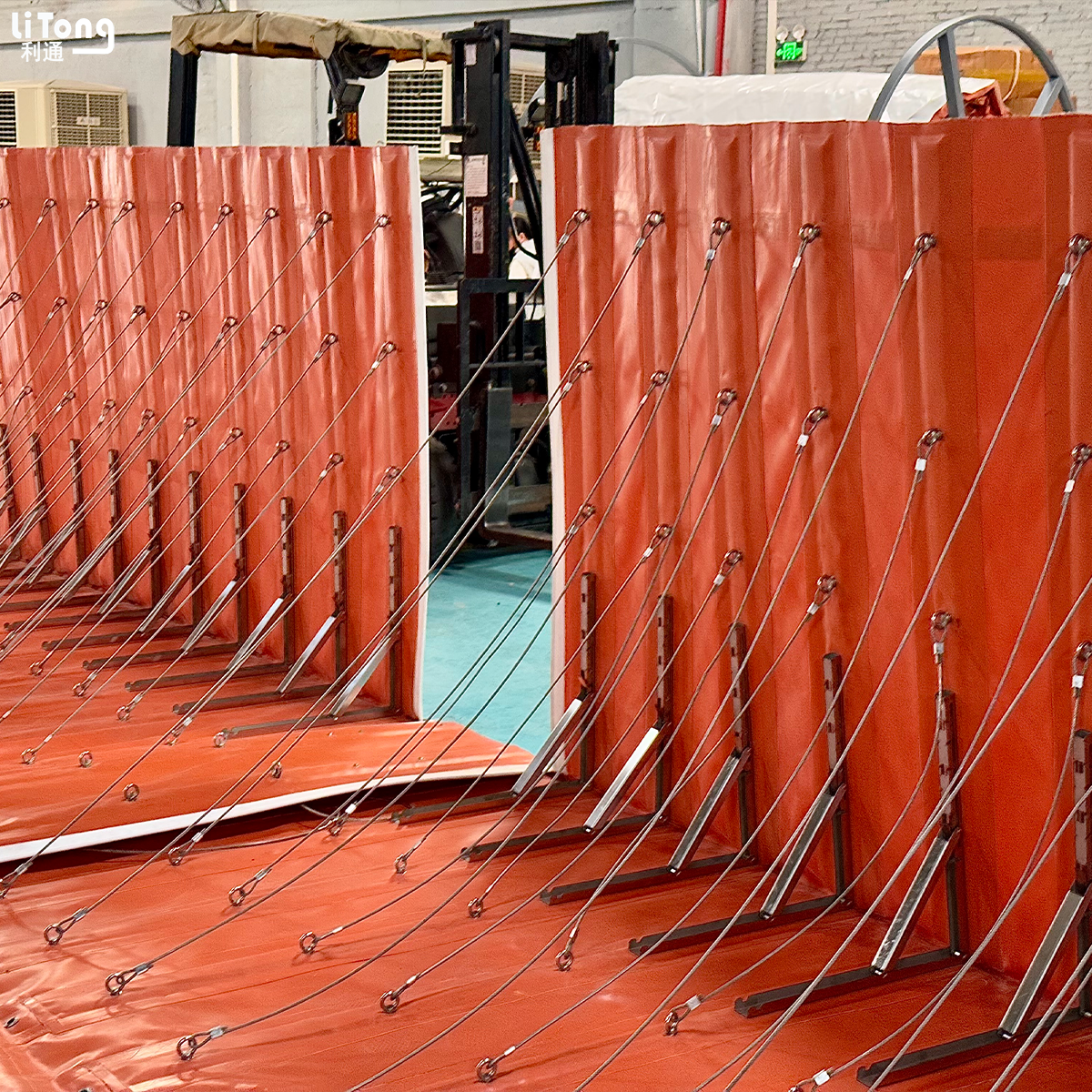 Retractable flood barrier with gate