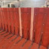 Retractable flood barrier with gate