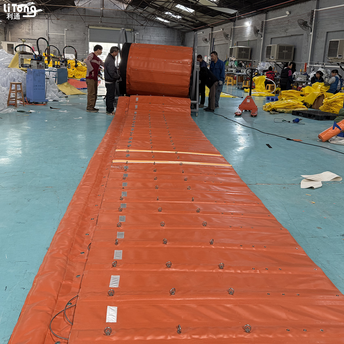 Retractable flood barrier with gate