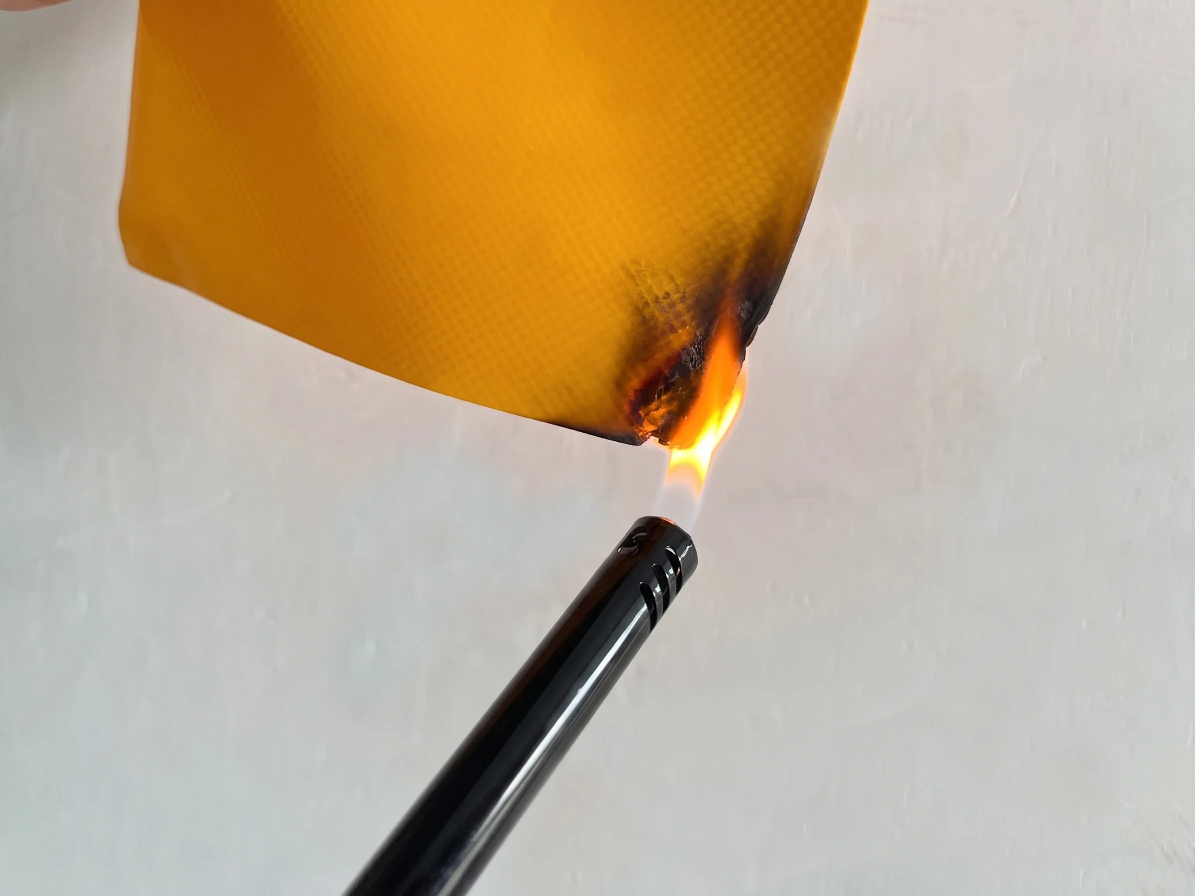 Fire‑resistant raw fabric for modular flood barrier